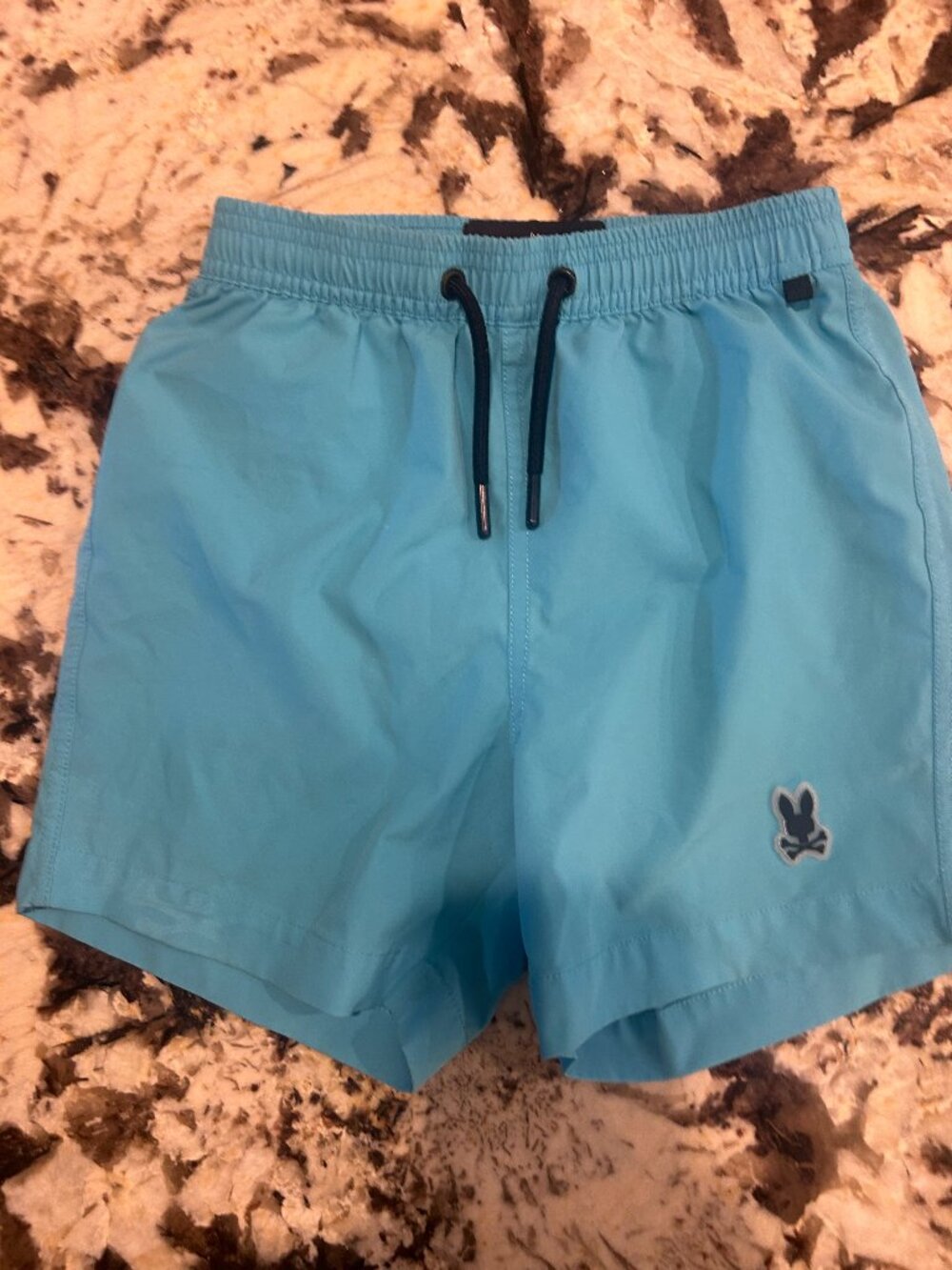 Psycho Bunny Kids Light Blue Swim Trunks with Navy Drawstring